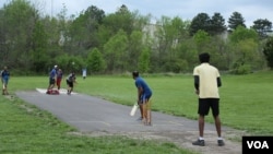 One of the 24 cricket teams in Kansas City practices on a shared field in the town of Olathe (R. Taylor/VOA)