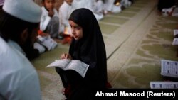 Assam, Rabu (5/1), mengesahkan undang-undang yang menghapuskan madrasah yang dikelola negara karena dianggap menyediakan pendidikan di bawah standar. (Foto: REUTERS/Ahmad Masood)