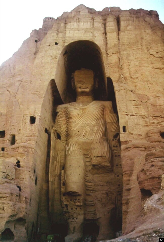 FILE - This is an undated photo of the world's tallest statue of Buddha, measuring 53 meters (175 feet) in Bamiyan, Afghanistan. According to Taliban officials, ruling Taliban soldiers demolished the head and legs of the statue, defying international plea