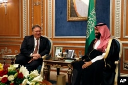FILE - U.S. Secretary of State Mike Pompeo meets with the Saudi Crown Prince Mohammed bin Salman in Riyadh, Saudi Arabia, Oct. 16, 2018.