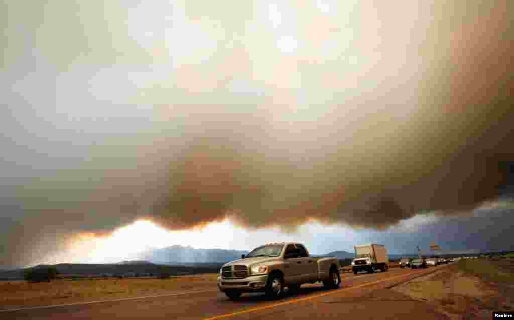 Smoke hovers over the I-25 north of Colorado Springs.