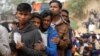 Rohingya refugees line up for daily essentials distribution at Balukhali camp, near Cox's Bazar, Bangladesh, Jan. 15, 2018. 