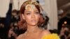 Rihanna in Queen's Garb Shuts Down Met Gala Red Carpet