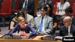 FILE - U.S. Ambassador to the United Nations, Samantha Power, addresses a resolution to investigate the use of chemical weapons in Syria during a United Nations Security Council meeting at the U.N. headquarters in New York, Aug. 7, 2015. On Friday, the U.N. Security Council received a report finding Syrian forces responsible for a third chemical weapons attack.