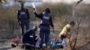 South African Police, Striking Miners Engage in Shootout