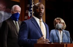 FILE - U.S. Senator Tim Scott (R-SC) speaks about his new police reform bill unveiled by Senate Republicans during a news conference on Capitol Hill in Washington, June 17, 2020.