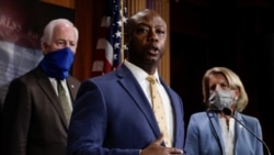 U.S. Senator Tim Scott (R-SC) is flanked by Senators Shelley Moore Capito (R-WV) and John Cornyn (R-TX) as he speaks about his new police reform bill unveiled by Senate Republicans during a news conference on Capitol Hill in Washington, June 17.
