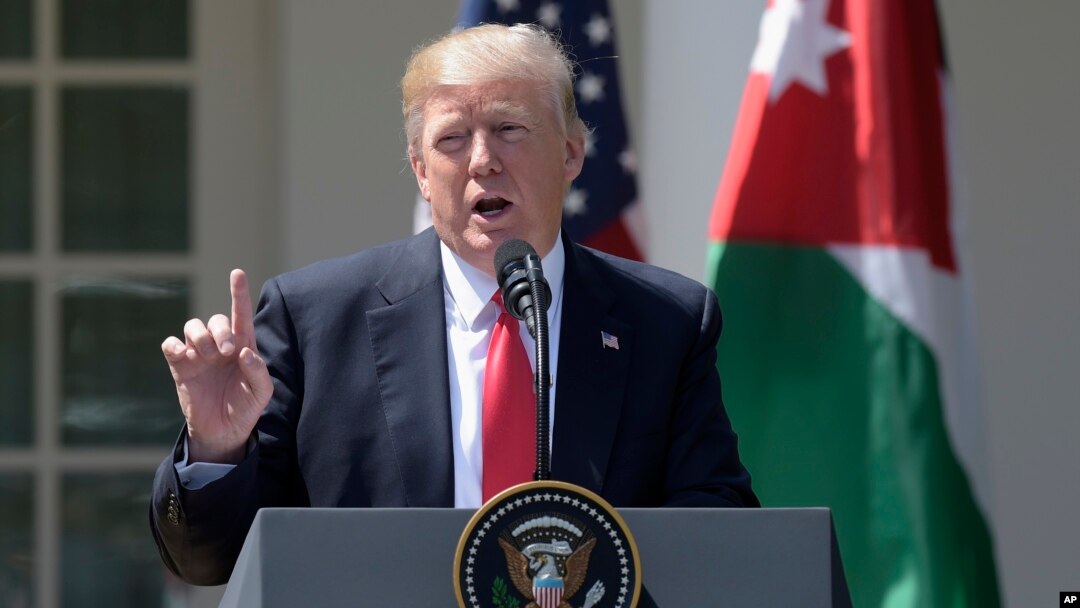 President Donald Trump talks about the attack in Syria during a news conference with Jordan's King Abdullah II, April 5, 2017, in the Rose Garden of the White House in Washington.