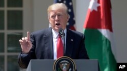 President Donald Trump talks about the attack in Syria during a news conference with Jordan's King Abdullah II, April 5, 2017, in the Rose Garden of the White House in Washington.