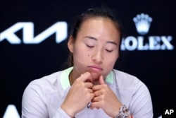 Zheng Qinwen of China reacts during a press conference following her loss to Aryna Sabalenka of Belarus in the women's singles final at the Australian Open tennis championships in Melbourne on Jan. 27, 2024.