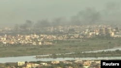 Drone video shows smoke rising over Sudanese city near Khartoum