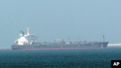 This undated photo made available by Nabeel Hashmi shows the oil tanker Pacific Zircon, in Jebel Ali port, in Dubai, Aug. 16, 2015. An oil tanker associated with an Israeli billionaire has been struck by a bomb-carrying drone off the coast of Oman. 