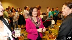 FILE - U.S. Senator Mazie Hirono, a Democrat representing Hawaii, greets supporters at the Democratic Party headquarters in Honolulu, Nov. 8, 2022. She was born in Japan to parents who were not U.S. citizens and became a U.S. citizen in 1959, the same year Hawaii became a state.