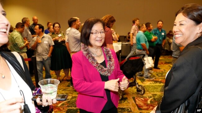 FILE - U.S. Senator Mazie Hirono, a Democrat representing Hawaii, greets supporters at the Democratic Party headquarters in Honolulu, Nov. 8, 2022. She was born in Japan to parents who were not U.S. citizens and became a U.S. citizen in 1959, the same year Hawaii became a state.