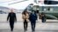 Vice President Kamala Harris and her husband, Doug Emhoff, arrive to board a plane to depart Andrews Air Force Base, Maryland., Nov. 16, 2022, en route to Thailand for the Asia-Pacific Economic Cooperation Summit.
