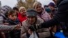 People receive food donations from World Central Kitchen in Kherson, in southern Ukraine, on Nov. 17, 2022.