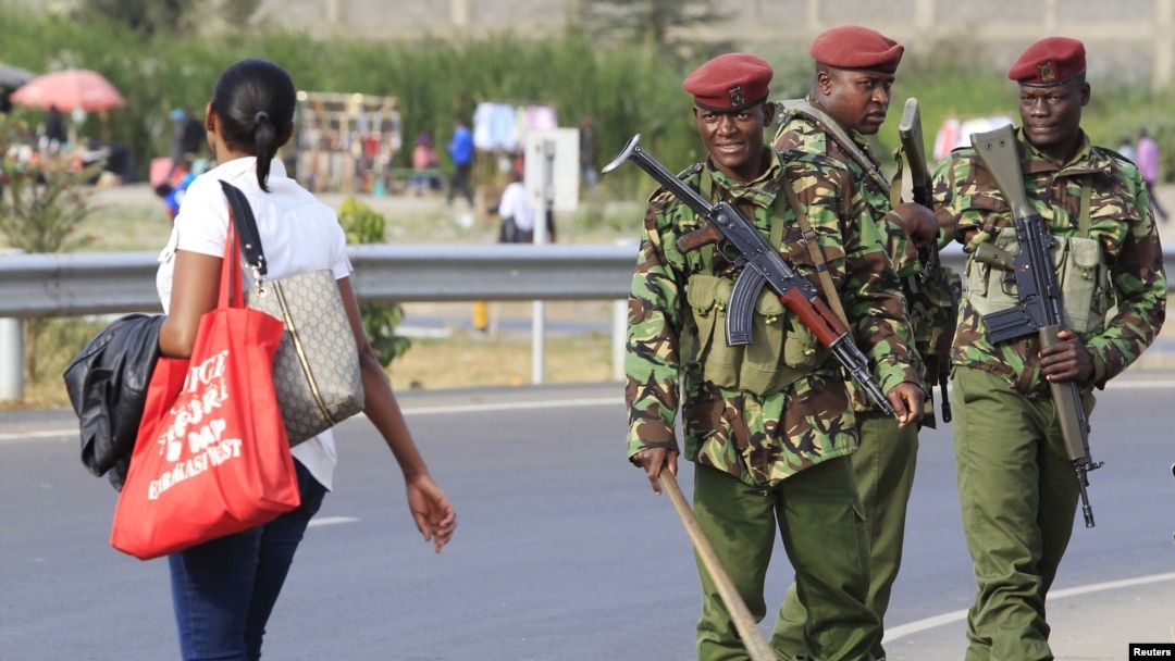 FILE - Members of the General Service Unit (GSU) patrol a section of an overpass in Kenya's capital, Nairobi, July 24, 2015. 