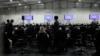 Delegates gather for a meeting with the COP27 presidency that was closed to the press, at the U.N. Climate Summit, in Sharm el-Sheikh, Egypt, Nov. 19, 2022. 