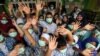 Siswa penyandang disabilitas yang memakai masker pelindung bereaksi di sekolah di tengah COVID-19, di Lhokseumawe, Aceh, 6 Maret 2020. (Foto: Antara/Rahmad via REUTERS)