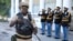Soldiers of the Haitian Armed Forces stands guard during a ceremony to mark the anniversary of the Battle of Vertieres, the last major battle for Haiti's independence from France, at Army headquarters in Port-au-Prince, Haiti, Nov. 18, 2022.