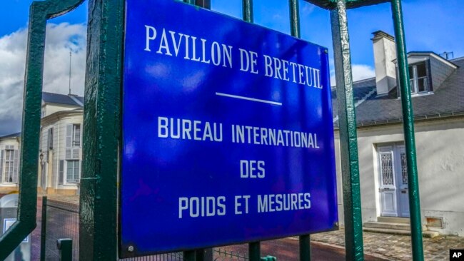 The entrance of the International Bureau of Weights and Measures is pictured in Sevres, outside Paris, Nov. 17, 2022.