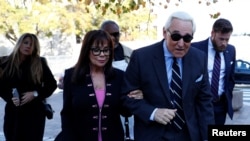 Roger Stone, former campaign adviser to U.S. President Donald Trump, arrives with his wife, Nydia Stone, for his criminal trial on charges of lying to Congress, obstructing justice and witness tampering at U.S. District Court in Washington, Nov. 6, 2019. 
