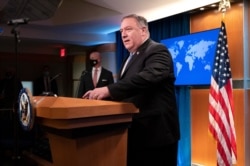 Secretary of State Mike Pompeo arrives for a media briefing, Nov. 10, 2020, at the State Department in Washington.