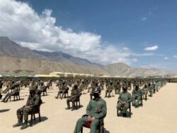 Soldiers await a visit by India's Prime Minister Narendra Modi in India's Himalayan desert region of Ladakh, India, July 3, 2020, in this still image taken from video.