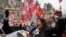 FILE: The May 1 protests follow earlier demonstrations at Paris town hall on Friday, April 14, 2023. The May 1 protests continue showing public anger at pension reforms that raise the full retirement age to 64.