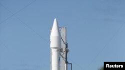 An Atlas V United Launch Alliance rocket carrying NASA's next Mars-bound spacecraft, the Mars Atmosphere and Volatile Evolution (MAVEN) spacecraft, is readied for launch at the Cape Canaveral Air Force Station in Cape Canaveral, Florida, November 17, 2013