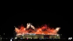 Fireworks explode over the Al Bayt Stadium before the start of the World Cup, group A soccer match between Qatar and Ecuador in Al Khor, Qatar.