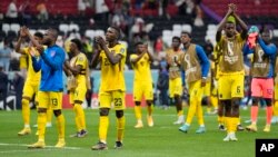 Ecuador players celebrate at the end of the World Cup group A soccer match between Qatar and Ecuador at the Al Bayt Stadium in Al Khor ,Qatar,, Nov. 20, 2022. Ecuador won 2-0.