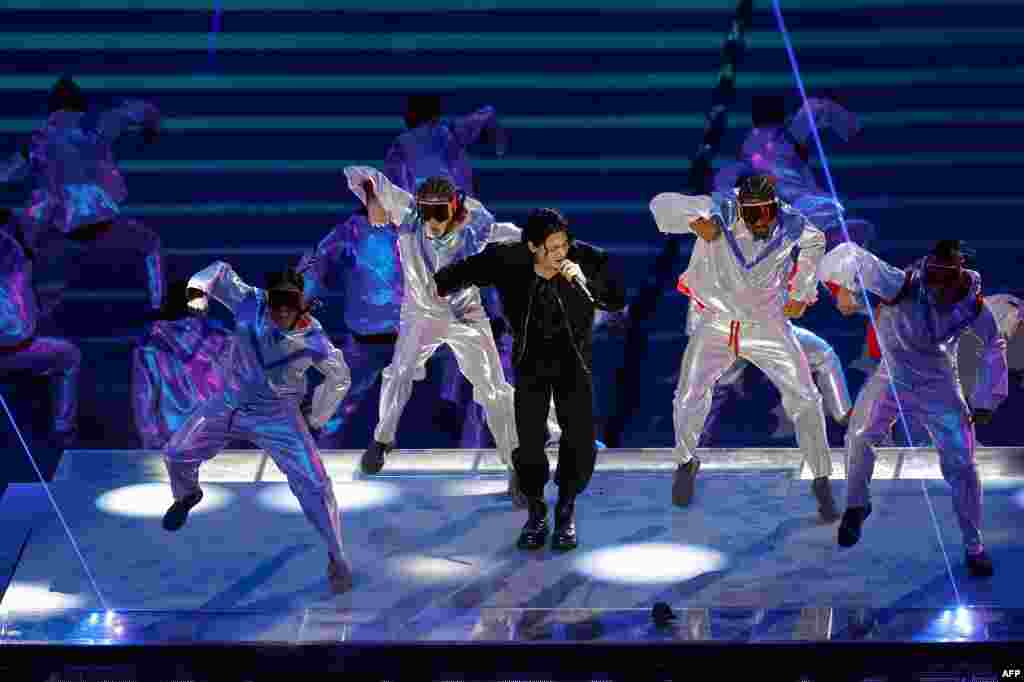 South Korean singer Jung Kook performs during the opening ceremony ahead of the Qatar 2022 World Cup Group.