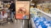 A man shops at a grocery store in Glenview, Illinois, Nov. 19, 2022. Americans are bracing for a costly Thanksgiving this year, with double-digit percent increases in the price of turkey, potatoes, stuffing, canned pumpkin and other staples. 