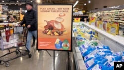 A man shops at a grocery store in Glenview, Illinois, Nov. 19, 2022. 