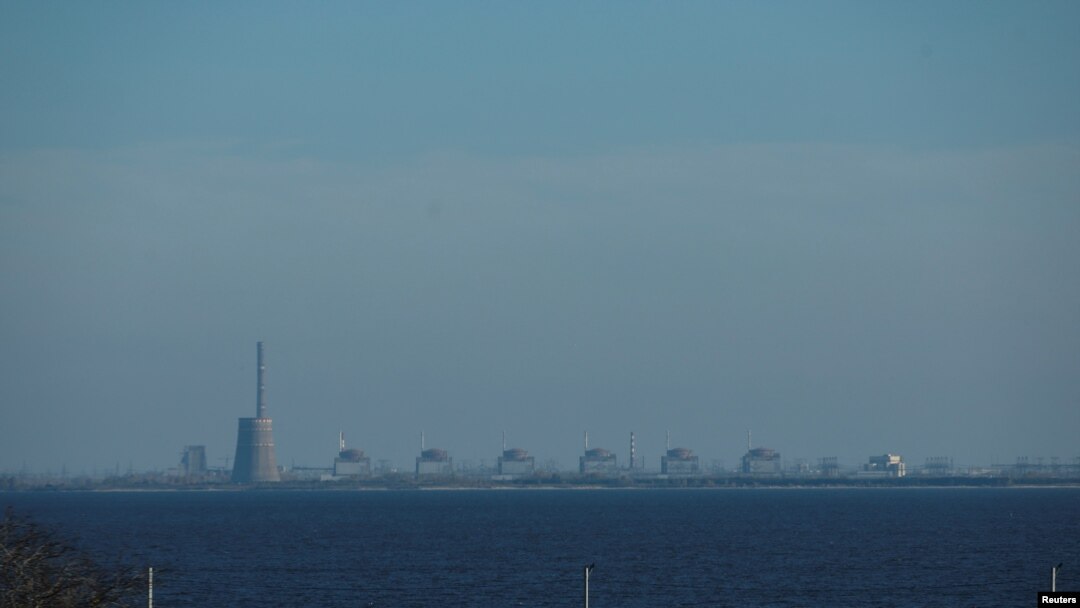 FILE - Reactors of the Zaporizhzhia Nuclear Power Plant, Europe's largest, are seen from the town of Nikopol, in Ukraine's Dnipropetrovsk region, Nov. 7, 2022, amid Russia's ongoing invasion of its neighbor.
