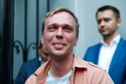 FILE - Prominent Russian investigative journalist Ivan Golunov leaves an Investigative Committee building in Moscow, June 11, 2019.