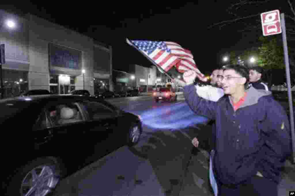 Arab Americans celebrate the news of the death of Osama Bin Laden in Dearborn, Michigan, early Monday, May 2, 2011 (AP)