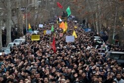 Protesters demonstrate over the U.S. airstrike in Iraq that killed Iranian Revolutionary Guard Gen. Qassem Soleimani in Tehran, Iran, Jan. 4, 2020.