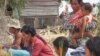 A group of villagers lit incense, in Kampong Speu province. 