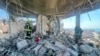 Bahrain civil defence and rescue personnel work in a residential building, which according to the Bahraini Interior Ministry, was hit by an Iranian drone, Muharraq, Bahrain, June 28, 2026.