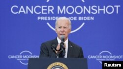 U.S. President Joe Biden delivers a speech on his "Cancer Moonshot" initiative at the John F. Kennedy Library and Museum in Boston, Massachusetts, Sept. 12, 2022. 