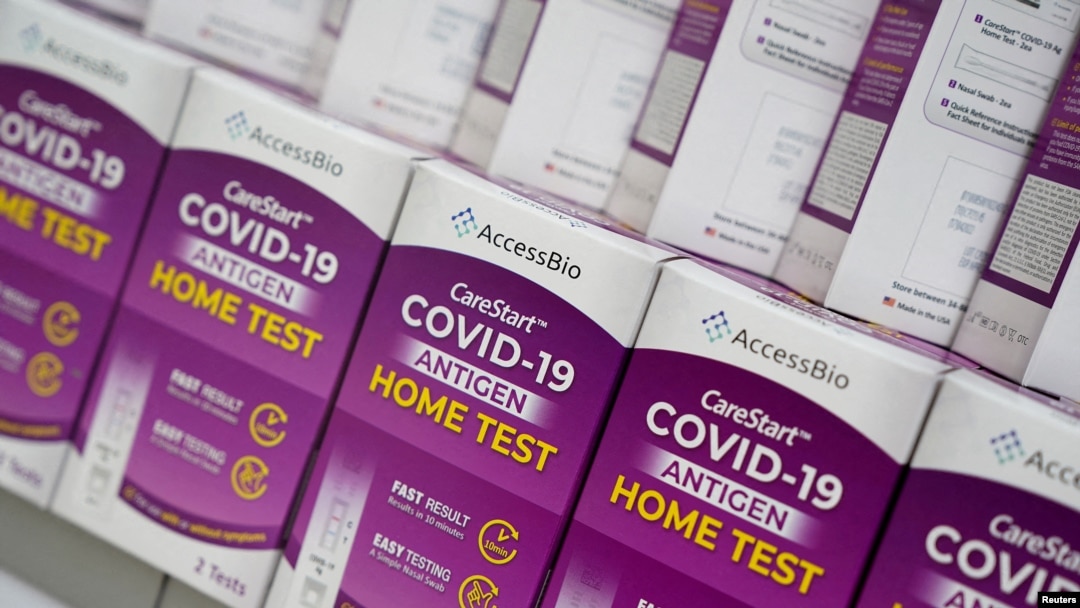 FILE - COVID-19 home test kits are pictured in a store window in the Manhattan borough of New York City, New York, Jan. 19, 2022. 
