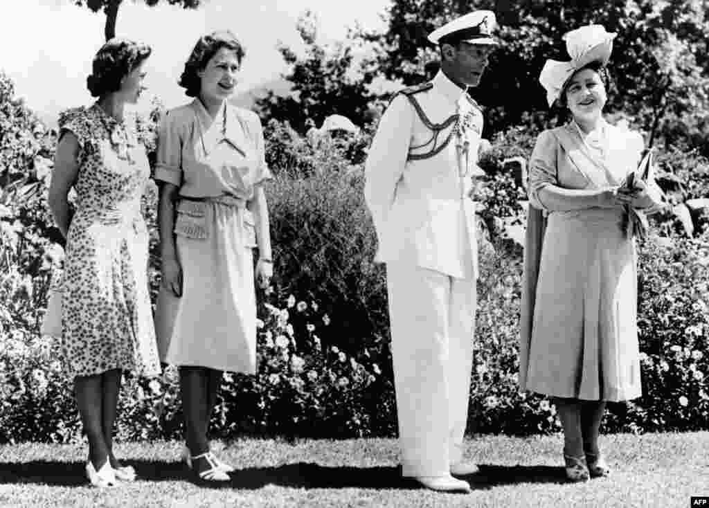 Princess Elizabeth poses with her father, King George VI, her mother Queen Elizabeth and her sister Princess Magaret in February 1947 in Cape Town during her first official state visit to South Africa.&nbsp;