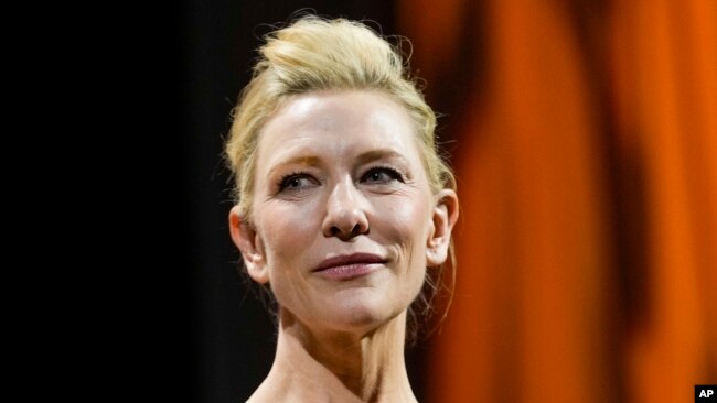 Cate Blanchett holds the Coppa Volpi award for best actress for the film