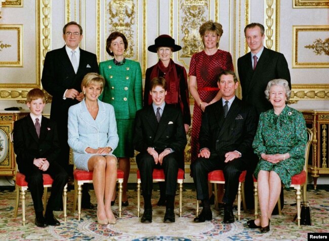 FILE - Britain's Prince Harry, Diana, Princess of Wales, Prince William, Charles, Prince of Wales, Queen Elizabeth II, King Constantine of Greece, Lady Susan Hussey, Princess Alexandra, Natalia Grosvenor, the Duchess of Westminster, and Lord Romsey pose for an official portrait in the white drawing room at Windsor Castle, Britain, March 9, 1997, after Prince William's confirmation at St Georges Chapel. (Pool via REUTERS/File Photo)