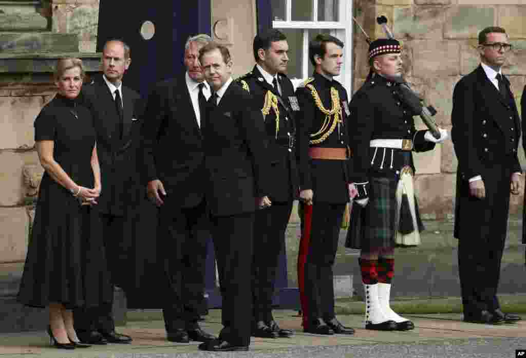 Sophie, the Countess of Wessex and Prince Edward and others await the hearse carrying the coffin of Queen Elizabeth II, at Holyroodhouse in Edinburgh, Sept. 11, 2022.