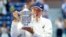 Iga Swiatek of Poland poses for a photo with the championship trophy after defeating Ons Jabeur of Tunisia in the women's singles final of the US Open tennis championships, Sept. 10, 2022, in New York.