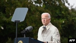 FILE: US President Joe Biden speaks during a remembrance ceremony to mark the 21st anniversary of the 9/11 attacks, at the Pentagon in Washington, DC, on September 11, 2022