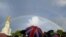 A double rainbow forms as people gather outside Buckingham Palace, following a statement from the Palace over concerns for Britain's Queen Elizabeth's health, in London, Britain. The Palace later announced the Queen's death.